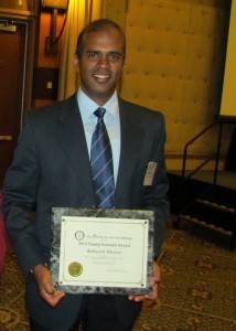 Sadanand Dhekney receiving the Young Scientist Award in 2013